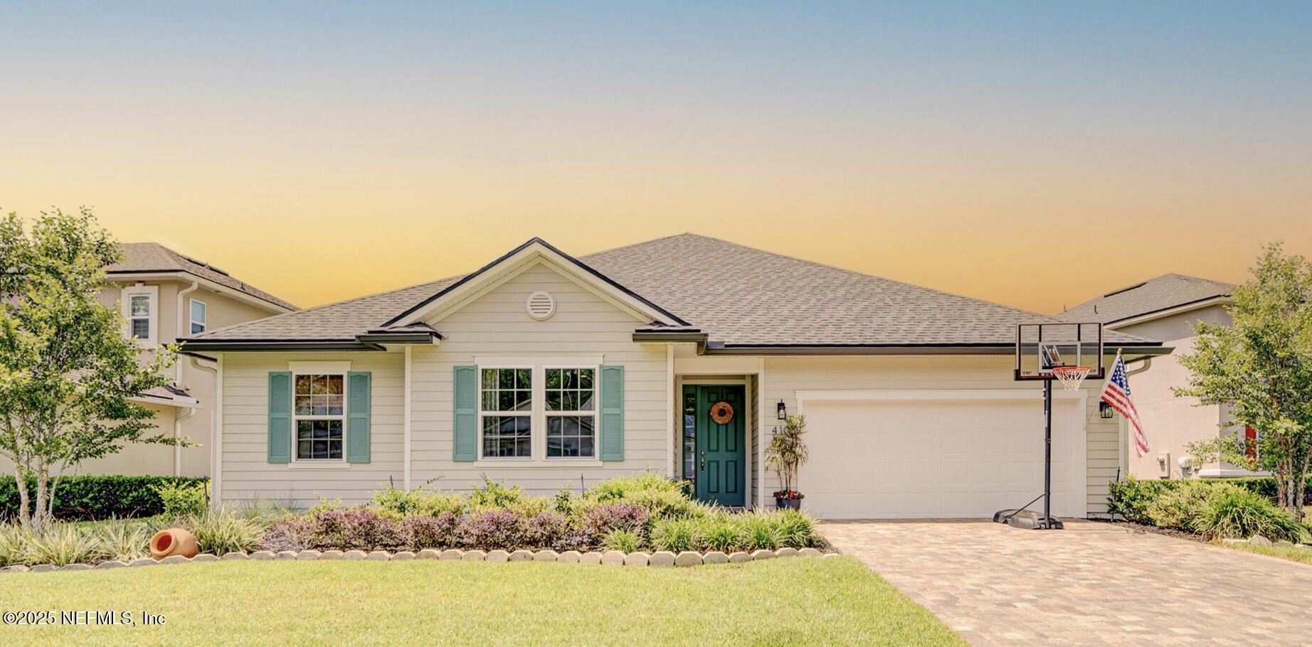 410 Downs Corner Road St. Augustine, FL 32092 - Photo 4 of 45 front view of a house and a yard
