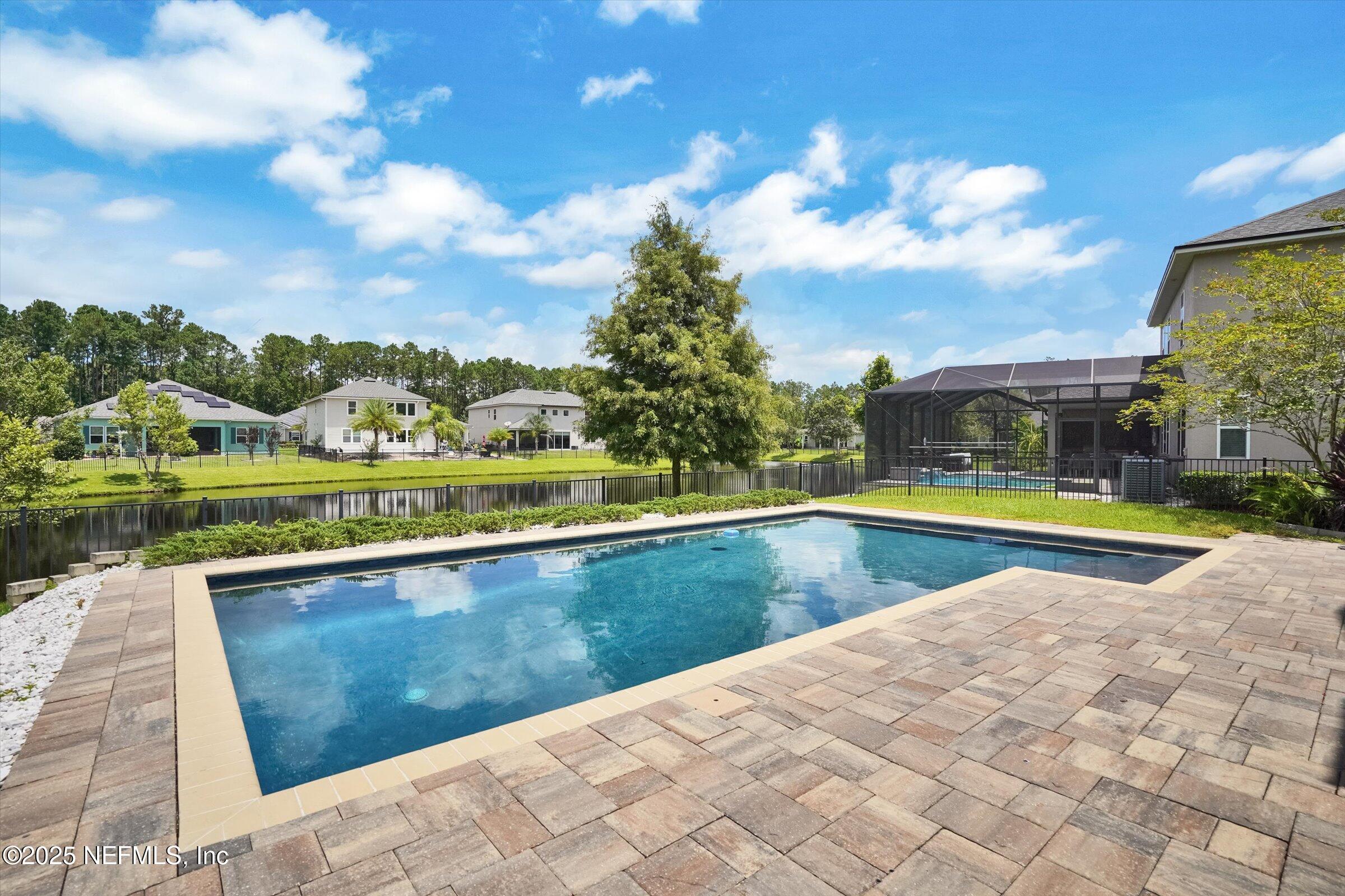 410 Downs Corner Road St. Augustine, FL 32092 - Photo 41 of 45 a view of swimming pool with a yard