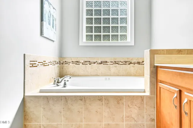 a bathroom with a bathtub