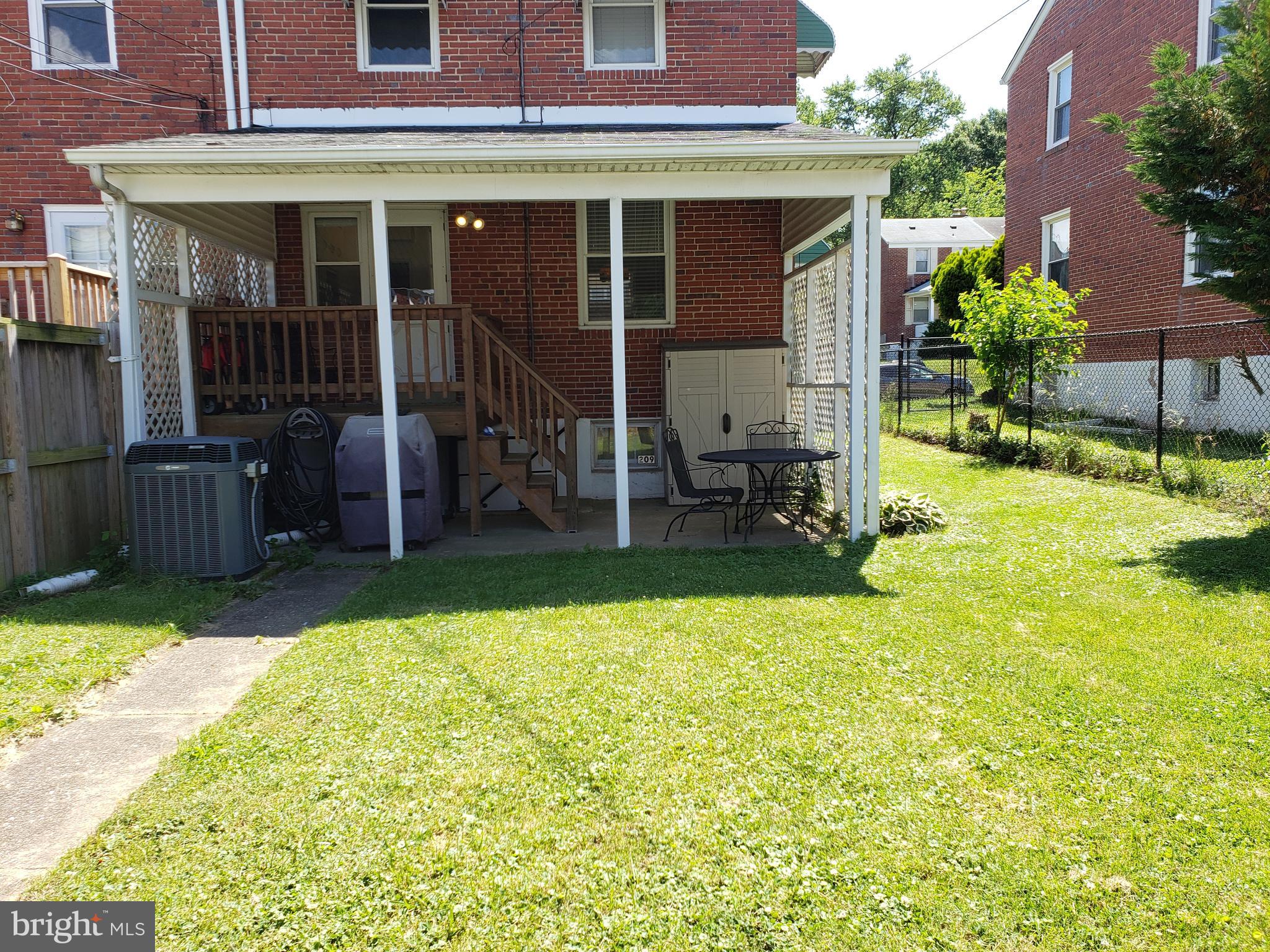 209 Cherrydell Road Baltimore, MD 21228 - Photo 51 of 54 Back of house from fence.