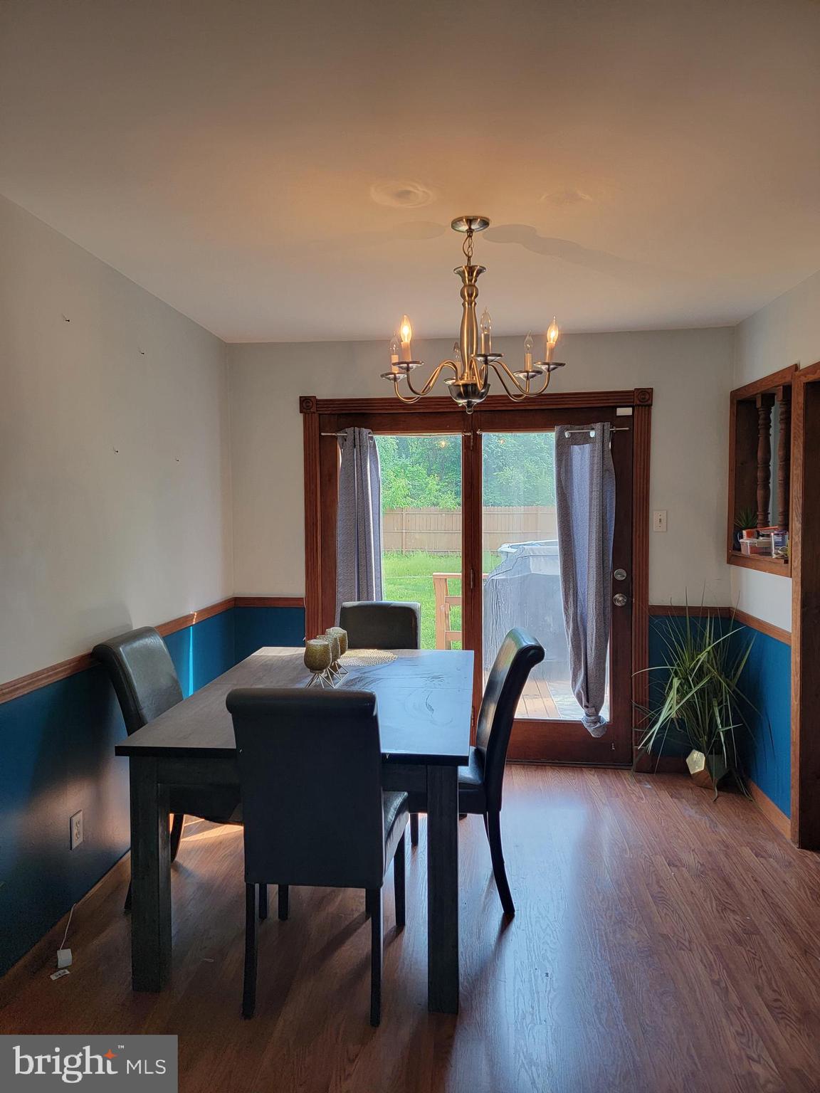 635 West County Line Road Hatboro, PA 19040 - Photo 7 of 10 a view of a dining room with furniture window and wooden floor