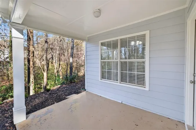 a view of a room with a large window
