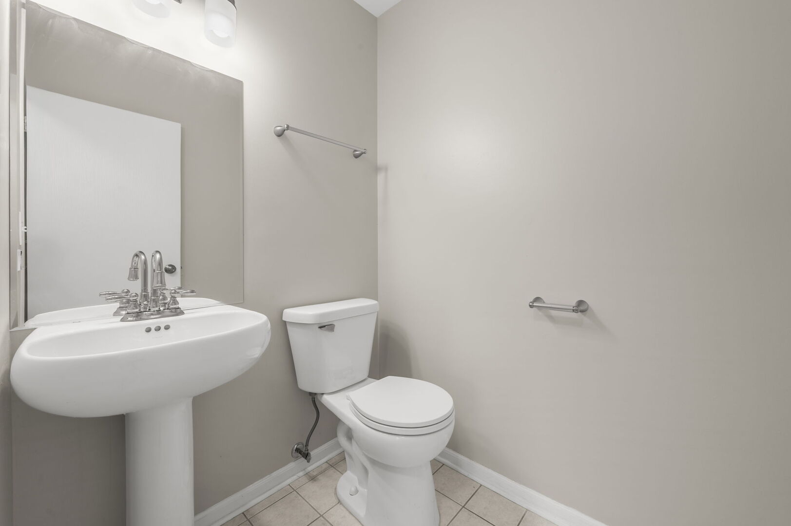 4508 Azalea Avenue Monee, IL 60449 - Photo 14 of 26 a bathroom with a toilet sink and mirror