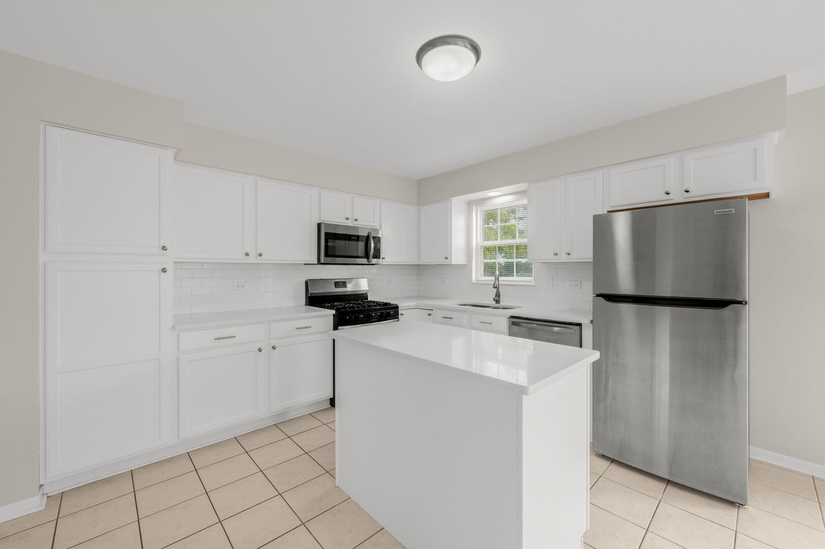 4508 Azalea Avenue Monee, IL 60449 - Photo 10 of 26 a kitchen with stainless steel appliances a refrigerator sink and microwave