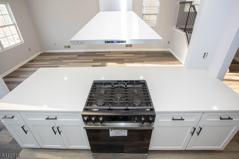 267 Perry Avenue Union, NJ 07083 - Photo 17 of 46 a stove top oven sitting inside of a kitchen