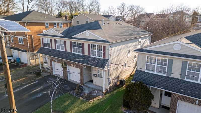 267 Perry Avenue Union, NJ 07083 - Photo 43 of 46 a front view of a house with a yard
