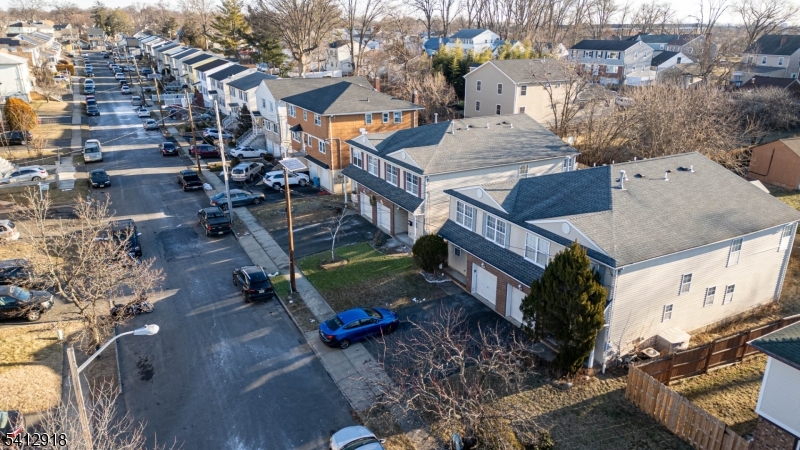267 Perry Avenue Union, NJ 07083 - Photo 46 of 46 an aerial view of multiple houses with a yard
