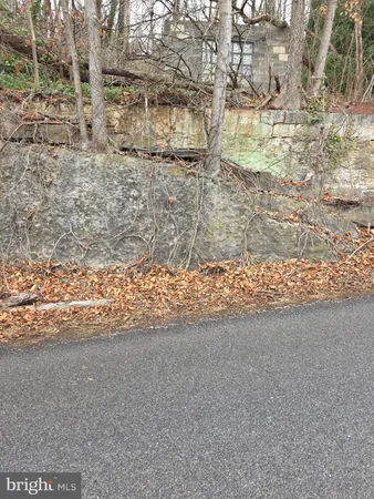 a view of a wooden floor and a building