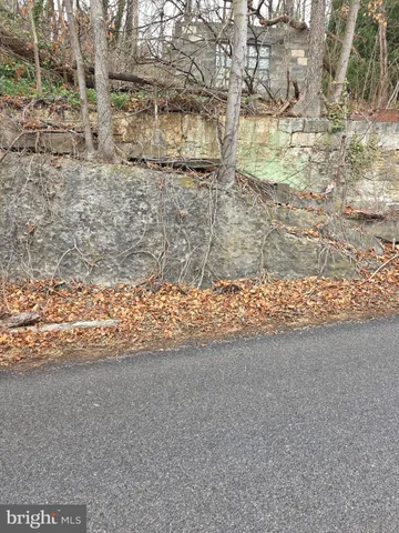 a view of a wooden floor and a building