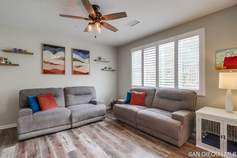 8532 Boulder Way Santee, CA 92071 - Photo 20 of 54 a living room with furniture and a large window