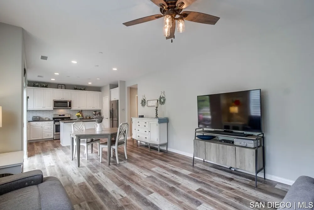 8532 Boulder Way Santee, CA 92071 - Photo 21 of 54 a living room with furniture and a flat screen tv