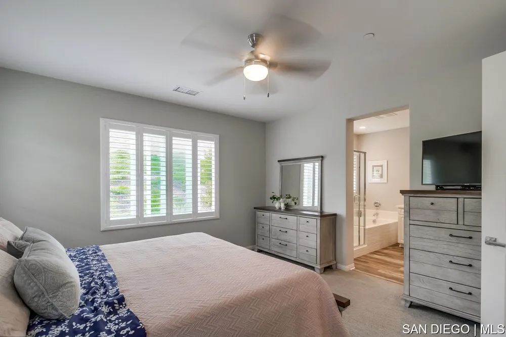 8532 Boulder Way Santee, CA 92071 - Photo 36 of 54 a bedroom with a bed and furniture