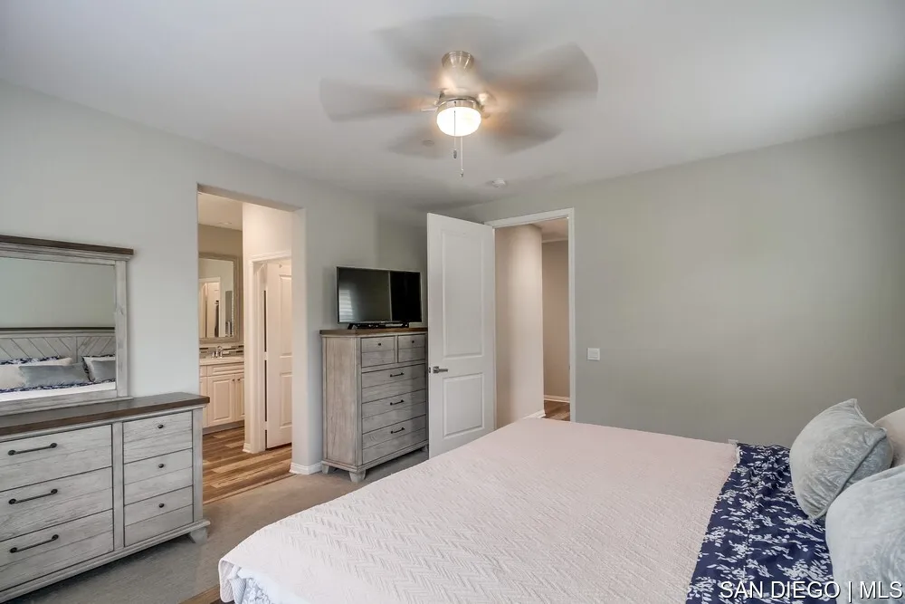 8532 Boulder Way Santee, CA 92071 - Photo 37 of 54 a bedroom with a bed and a television