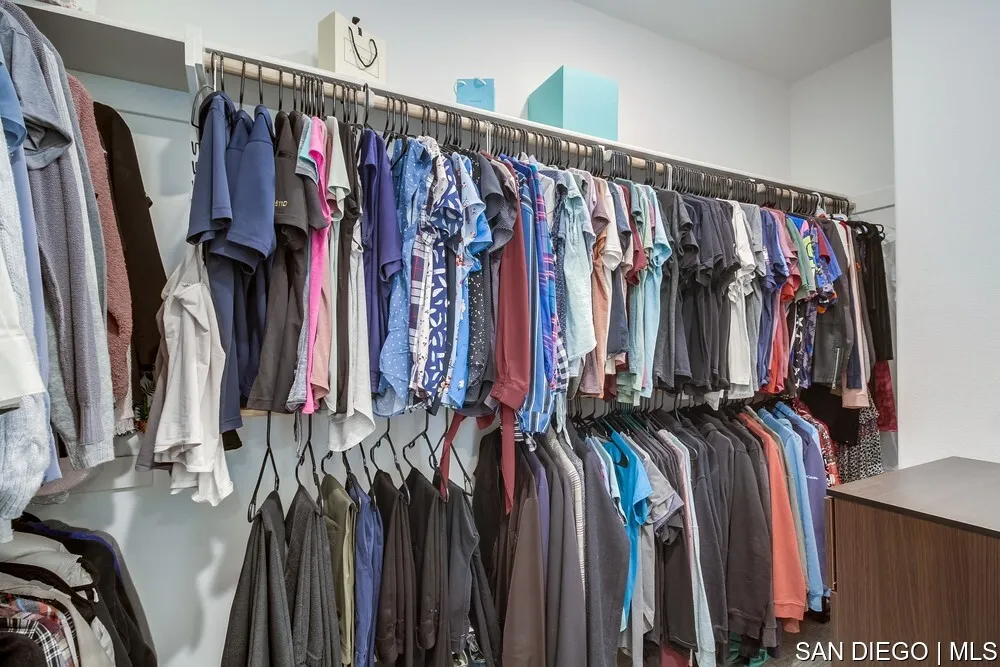 8532 Boulder Way Santee, CA 92071 - Photo 40 of 54 a view of walk in closet with clothes