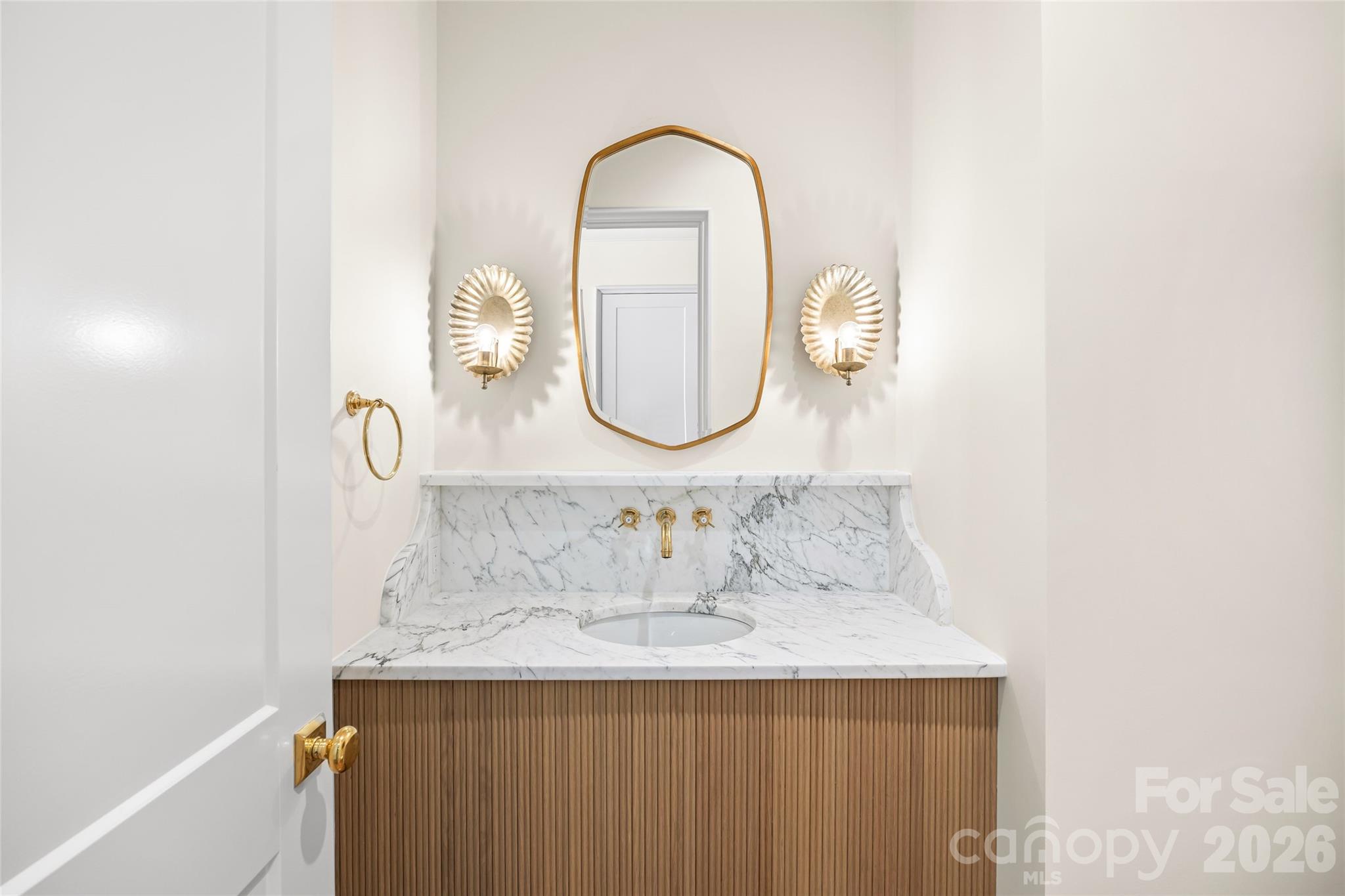 1615 Coventry Road Charlotte, NC 28211 - Photo 21 of 48 a bathroom with a sink and a mirror