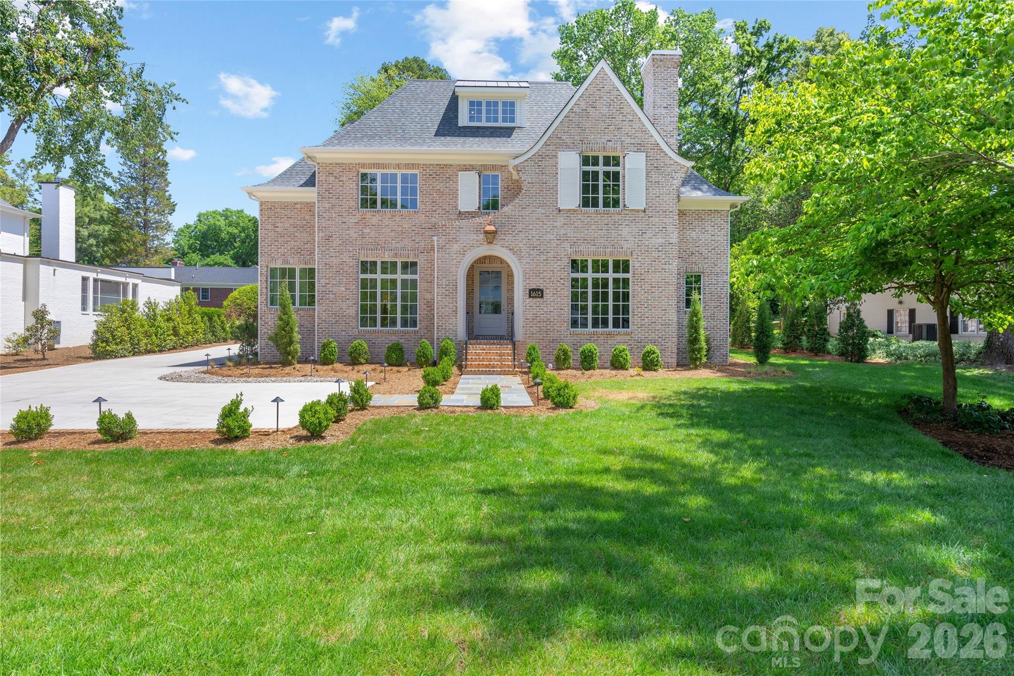 1615 Coventry Road Charlotte, NC 28211 - Photo 3 of 48 a view of a house with a big yard
