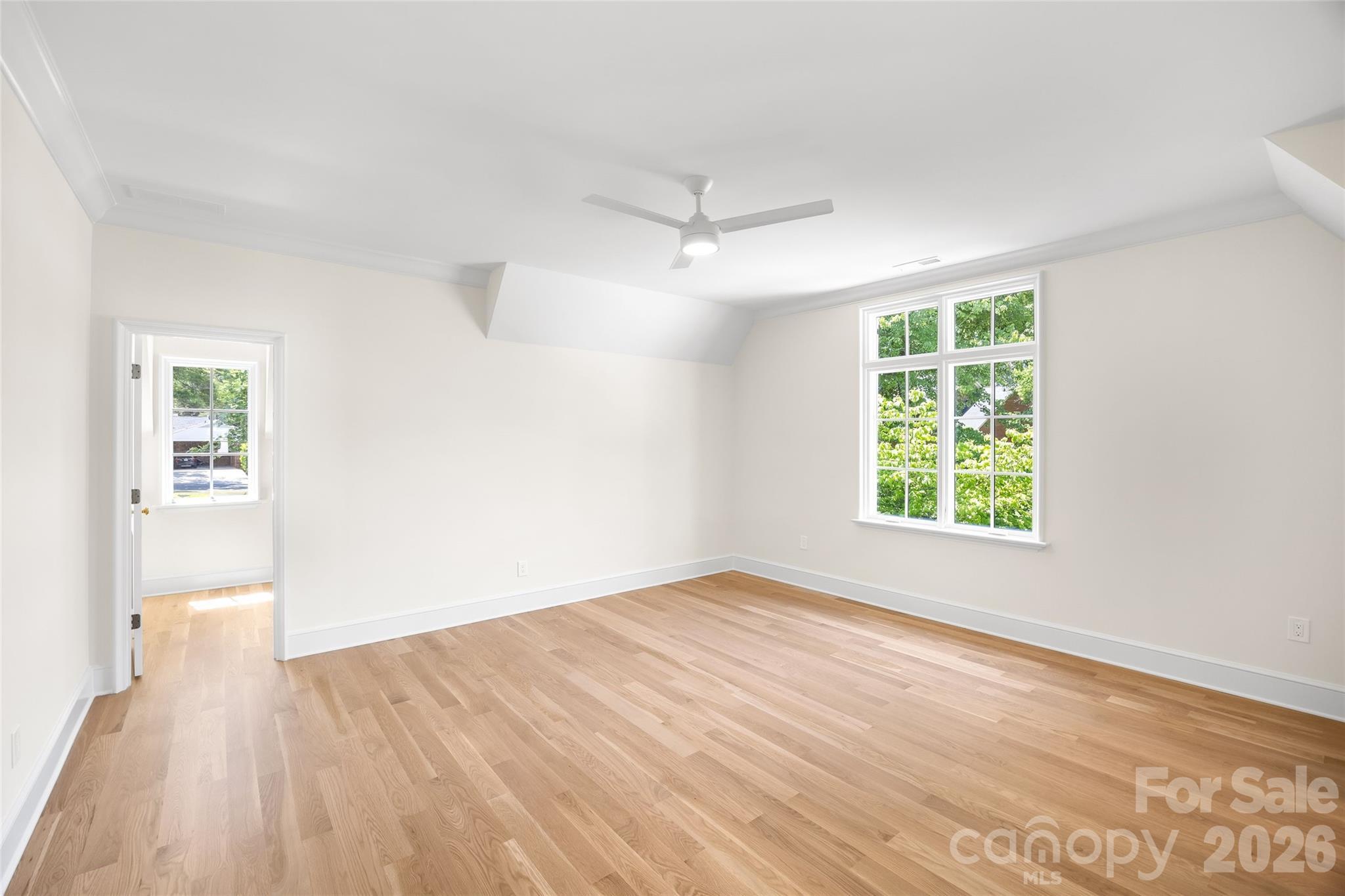 1615 Coventry Road Charlotte, NC 28211 - Photo 33 of 48 an empty room with wooden floor and windows