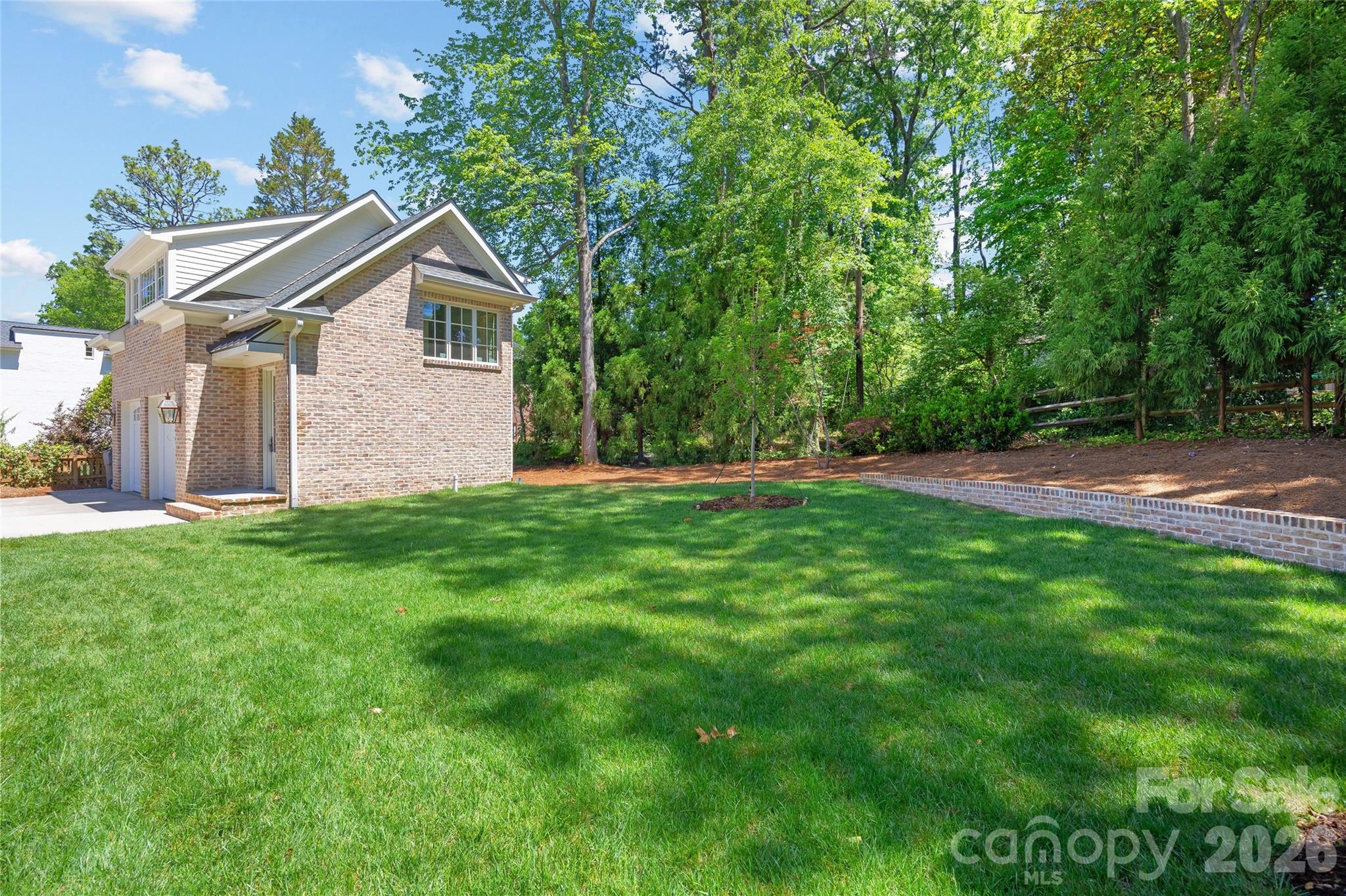 1615 Coventry Road Charlotte, NC 28211 - Photo 48 of 48 a front view of house with yard and green space