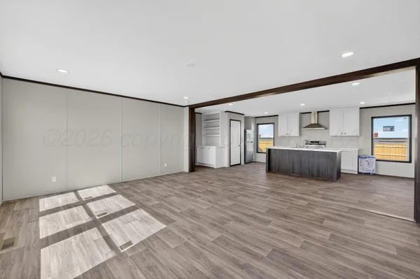 a view of a livingroom with wooden floor