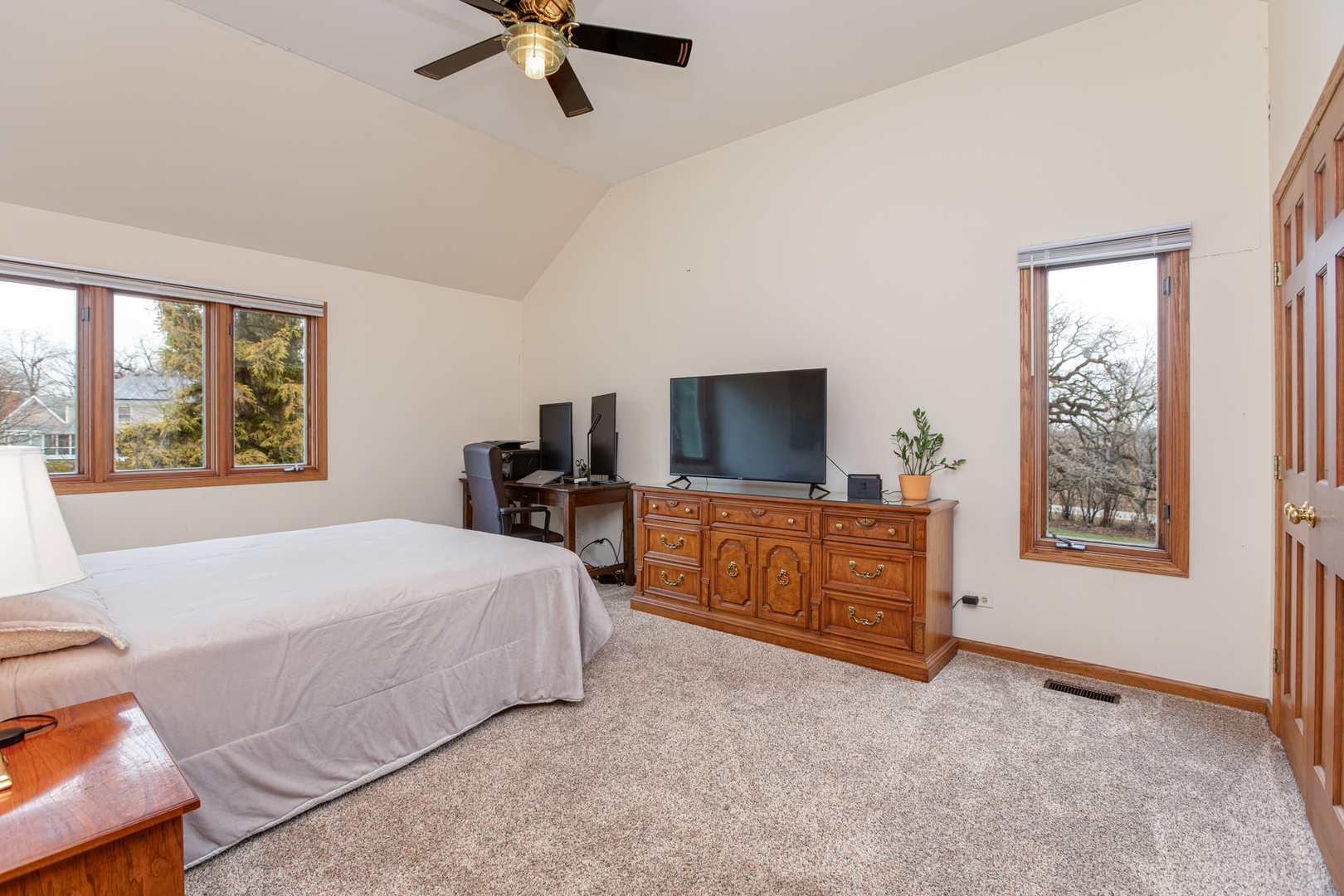 29W220 Oak Knoll Road West Chicago, IL 60185 - Photo 14 of 24 a bedroom with a bed and a flat screen tv