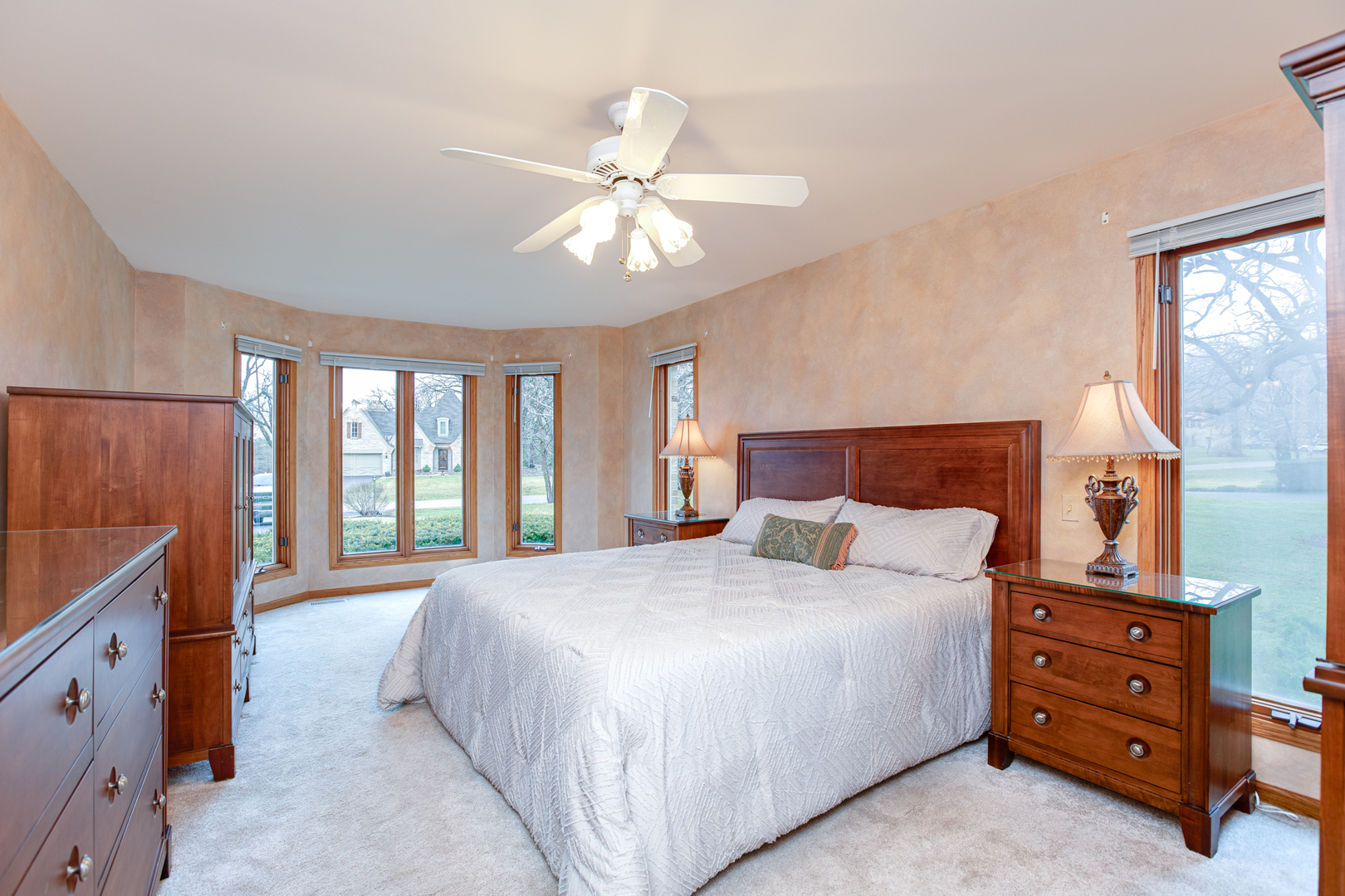 29W220 Oak Knoll Road West Chicago, IL 60185 - Photo 10 of 24 a bedroom with a bed and a window