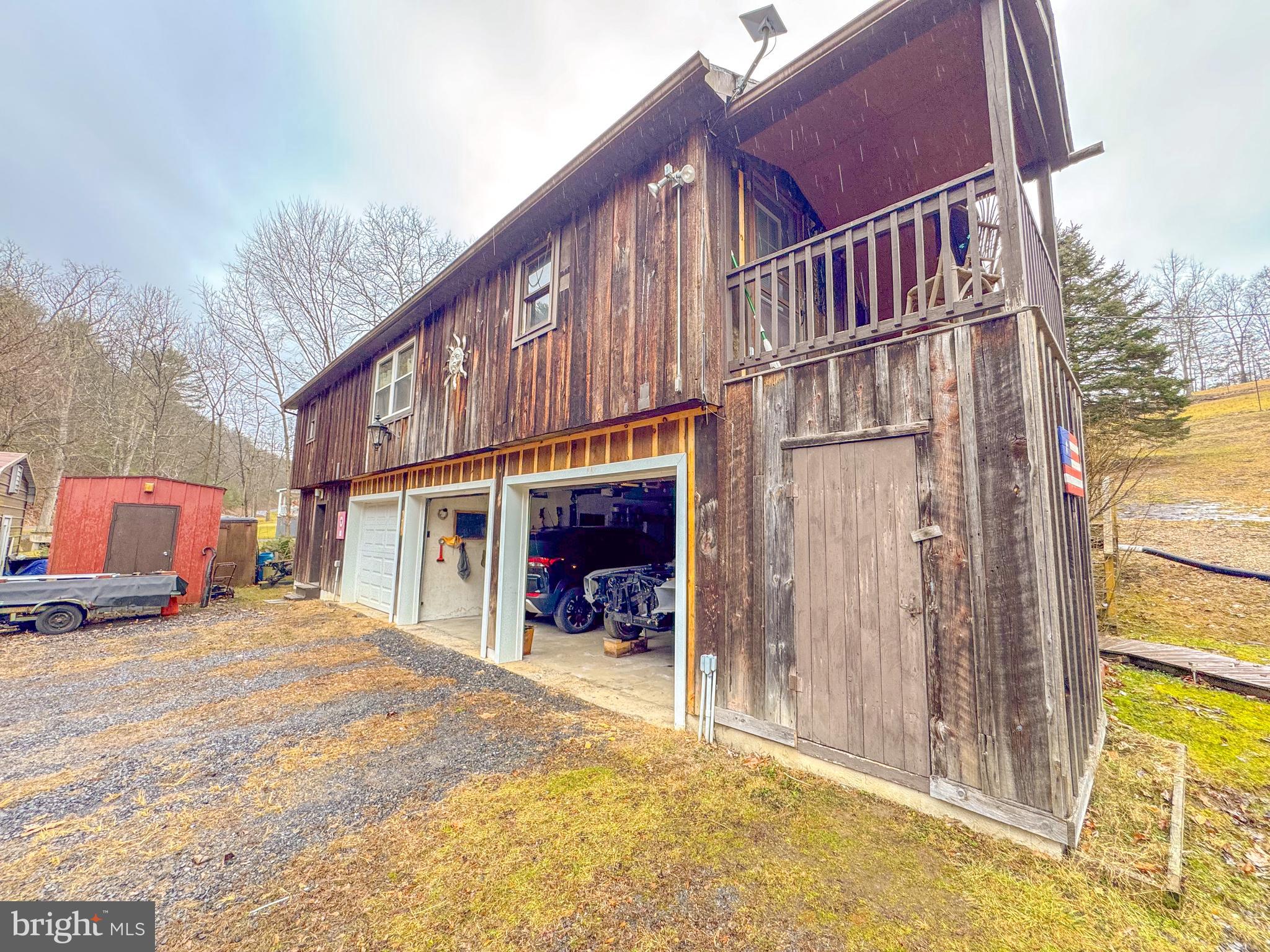12522 Bakers Hollow Road Hesston, PA 16647 - Photo 46 of 72 a view of a house with a patio