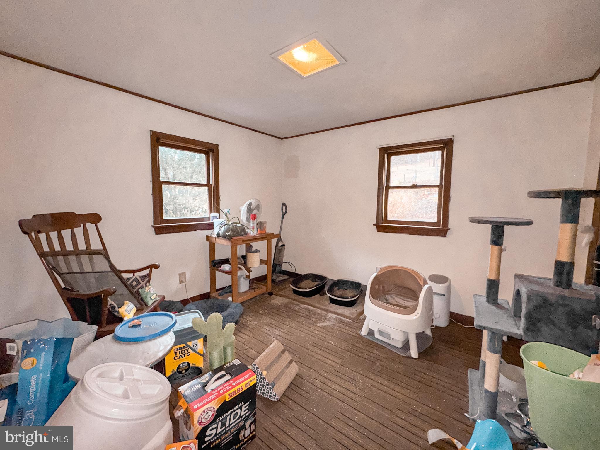 12522 Bakers Hollow Road Hesston, PA 16647 - Photo 52 of 72 a living room with furniture and a wooden floor