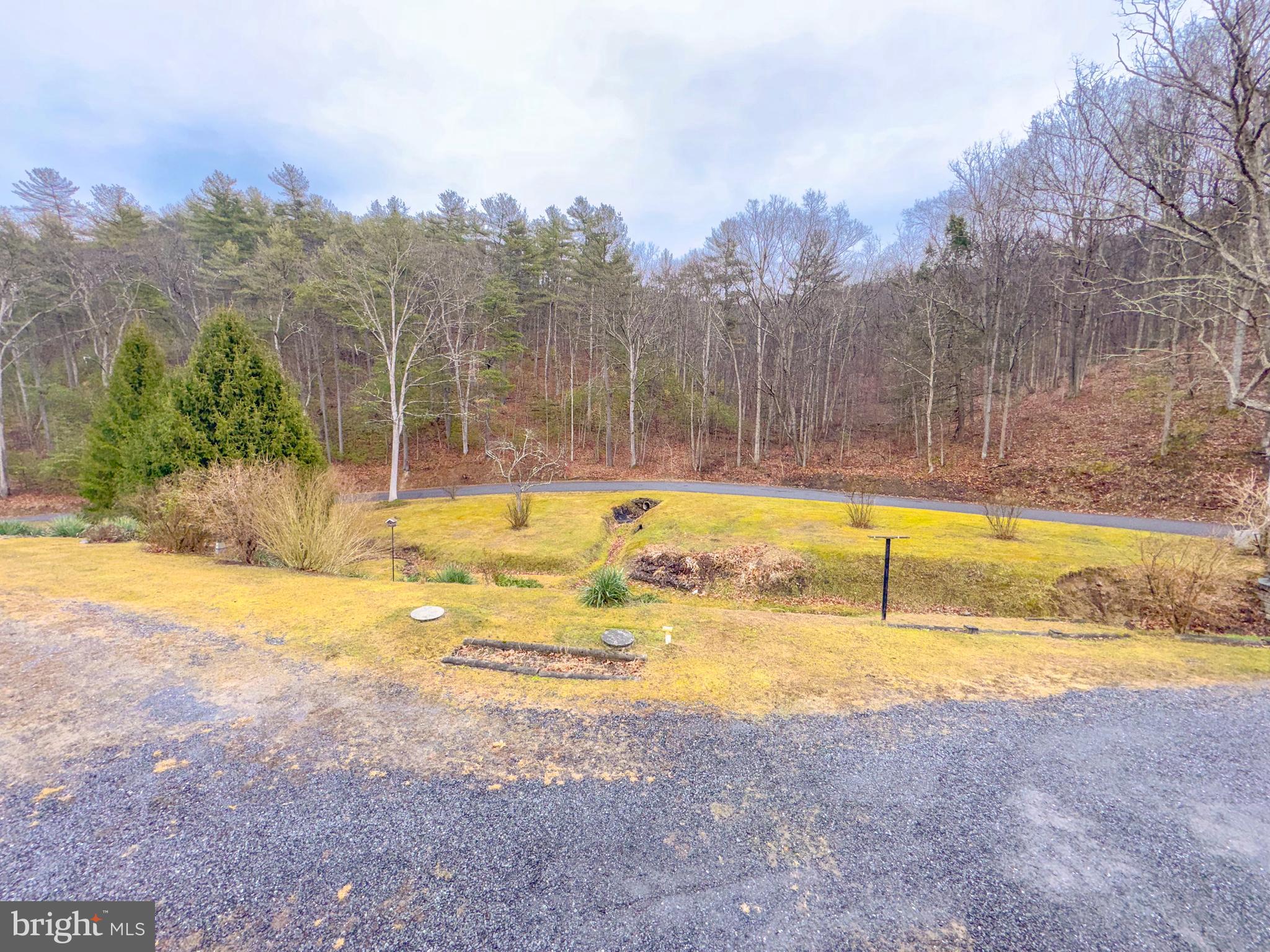 12522 Bakers Hollow Road Hesston, PA 16647 - Photo 57 of 72 a view of a swimming pool with an outdoor space and seating area