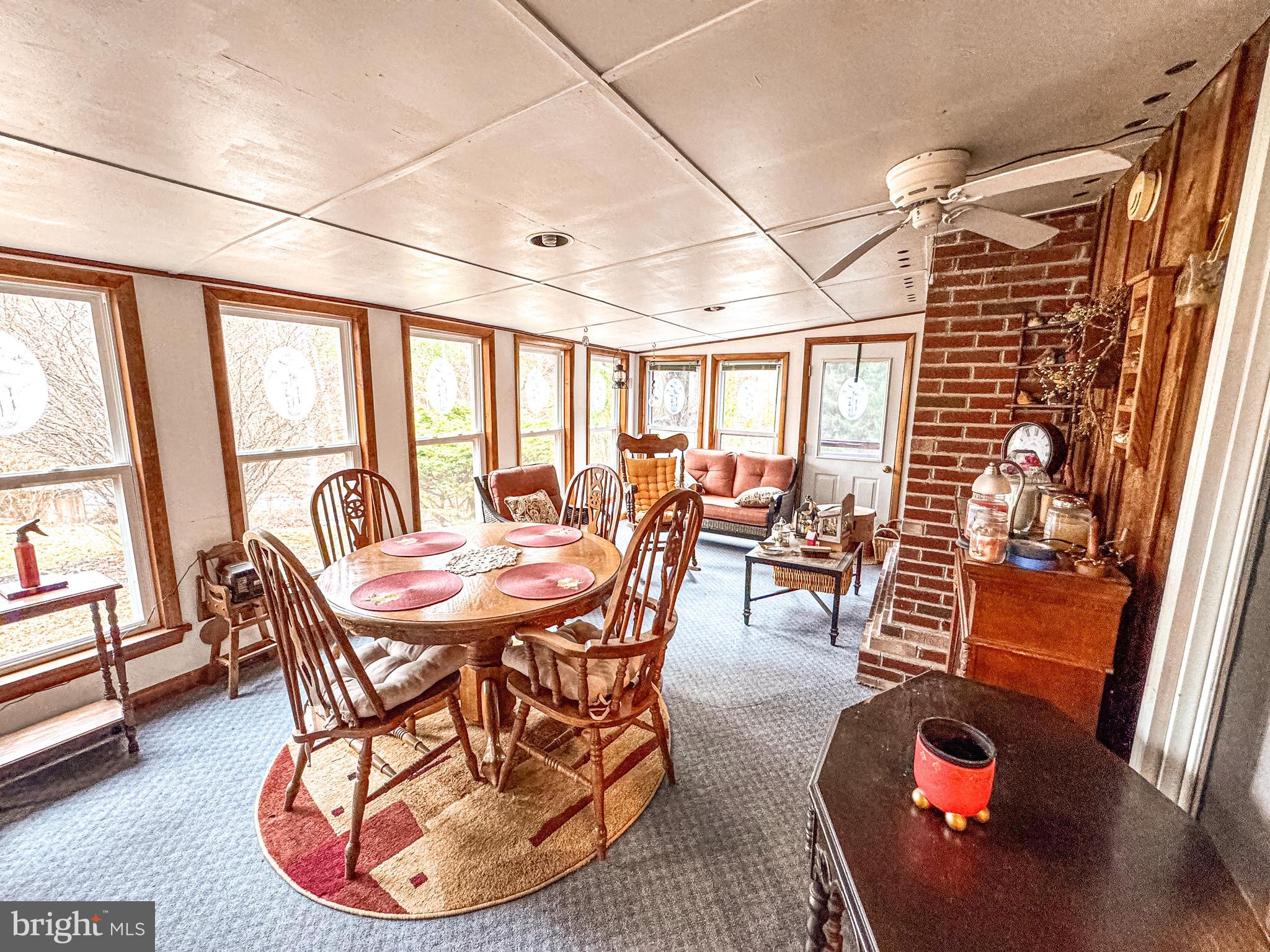 12522 Bakers Hollow Road Hesston, PA 16647 - Photo 7 of 72 a dining room with furniture and wooden floor