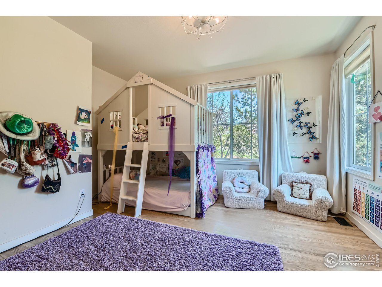 365 Vasquez Court Lyons, CO 80540 - Photo 17 of 40 a living room with furniture and a large window