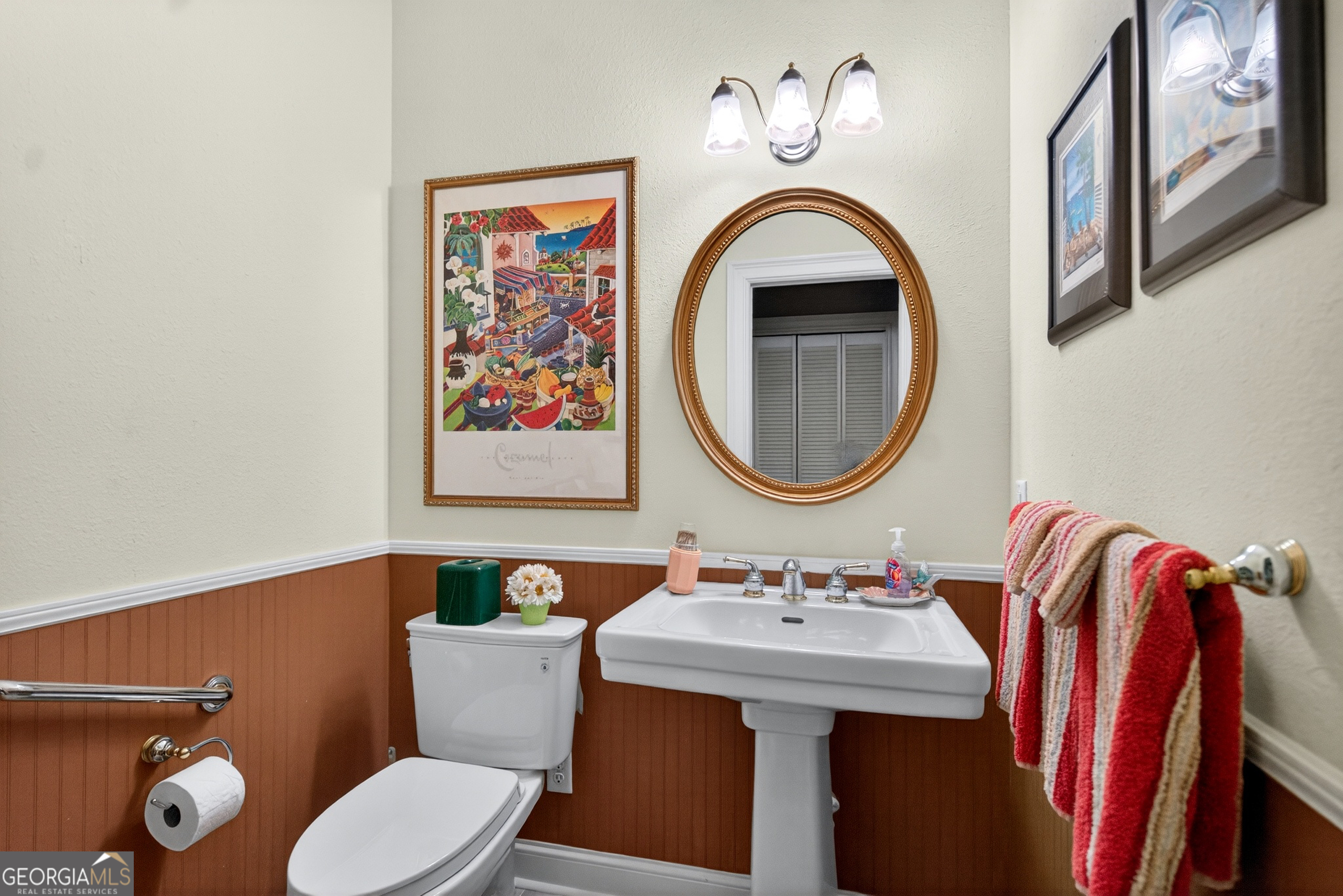 5 North Brooks Road LaGrange, GA 30240 - Photo 40 of 100 a bathroom with a sink a mirror and a toilet