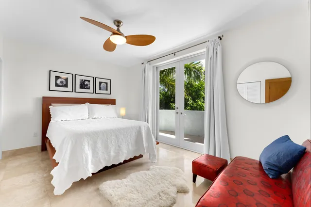 a view of a balcony with dining area