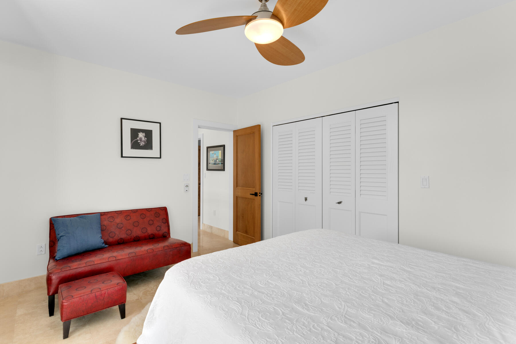 144 North Rolling Hill Road Tavernier, FL 33070 - Photo 29 of 80 a bedroom with a bed and cabinets