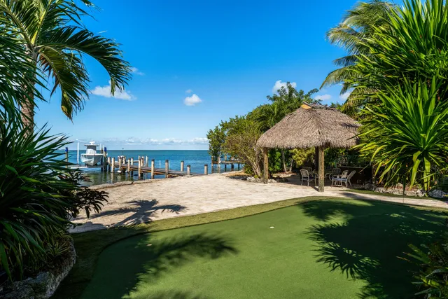 a view of balcony with furniture