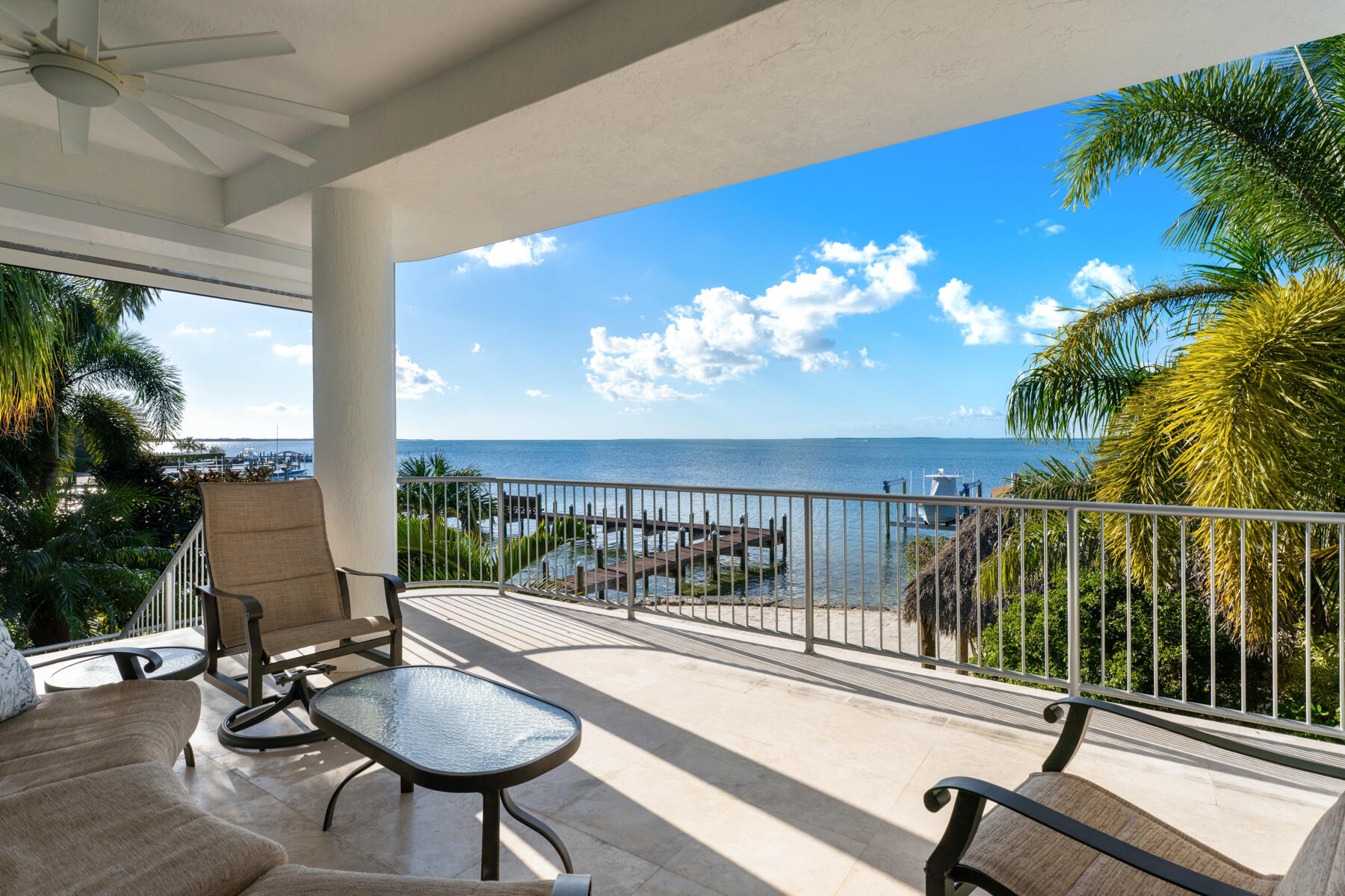 144 North Rolling Hill Road Tavernier, FL 33070 - Photo 40 of 80 a view of a balcony with dining area