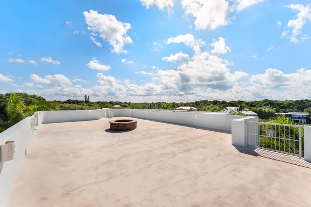 an aerial view of multiple house with outdoor space