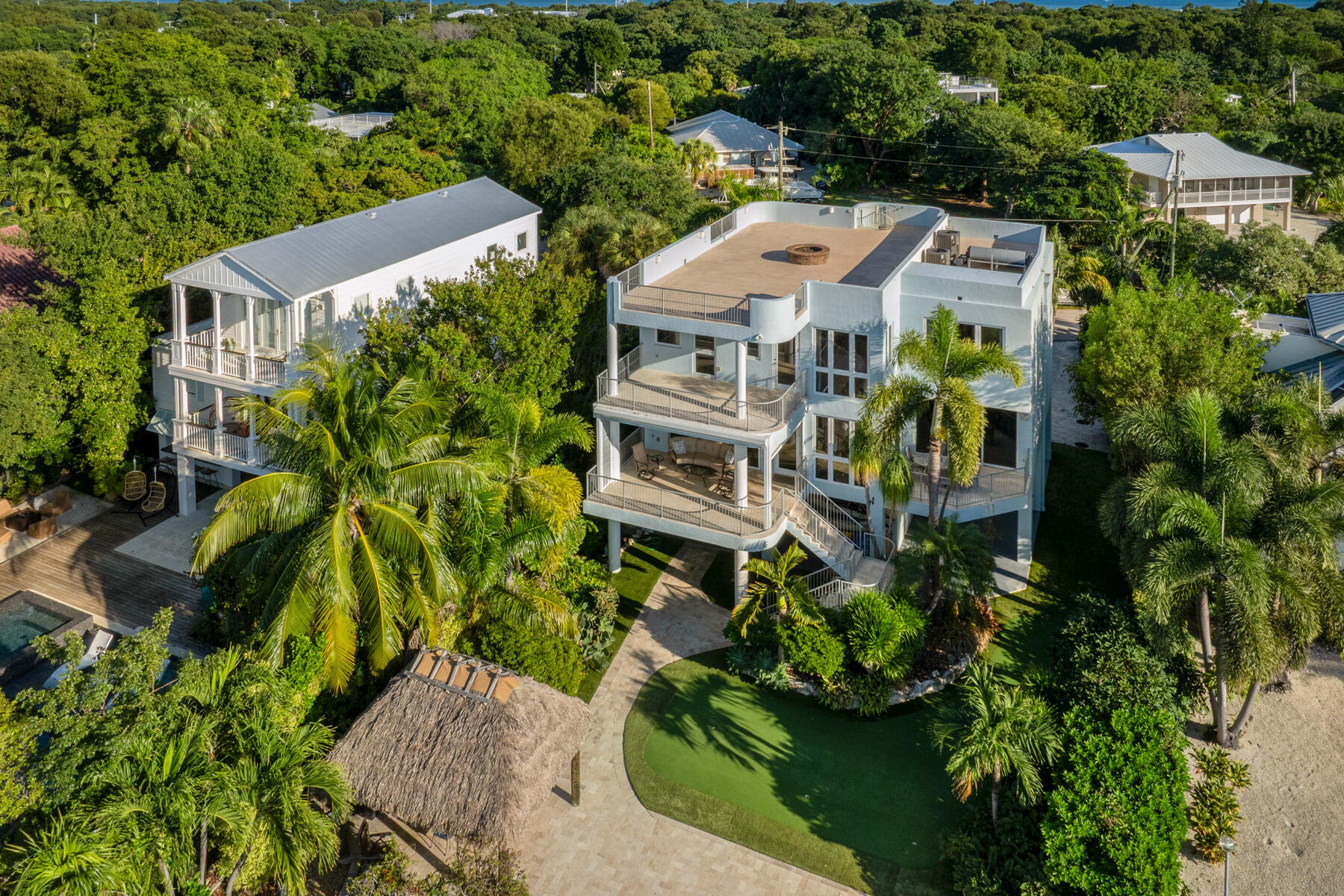 144 North Rolling Hill Road Tavernier, FL 33070 - Photo 56 of 80 an aerial view of a house with a yard