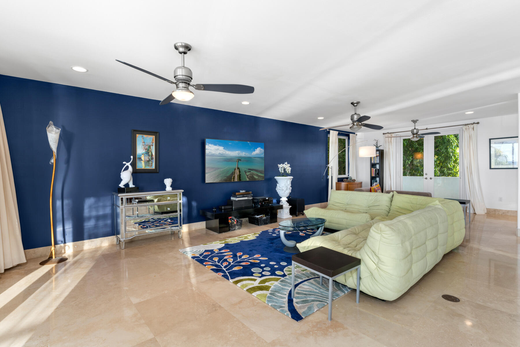 144 North Rolling Hill Road Tavernier, FL 33070 - Photo 9 of 80 a living room with furniture chandelier and a flat screen tv