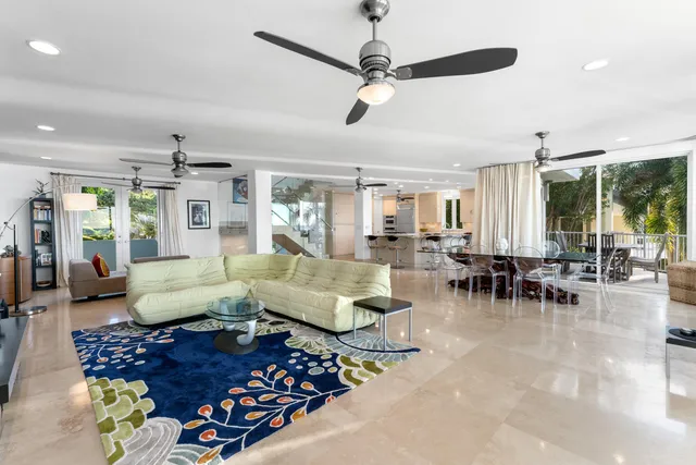 a kitchen with stainless steel appliances granite countertop a stove and a refrigerator