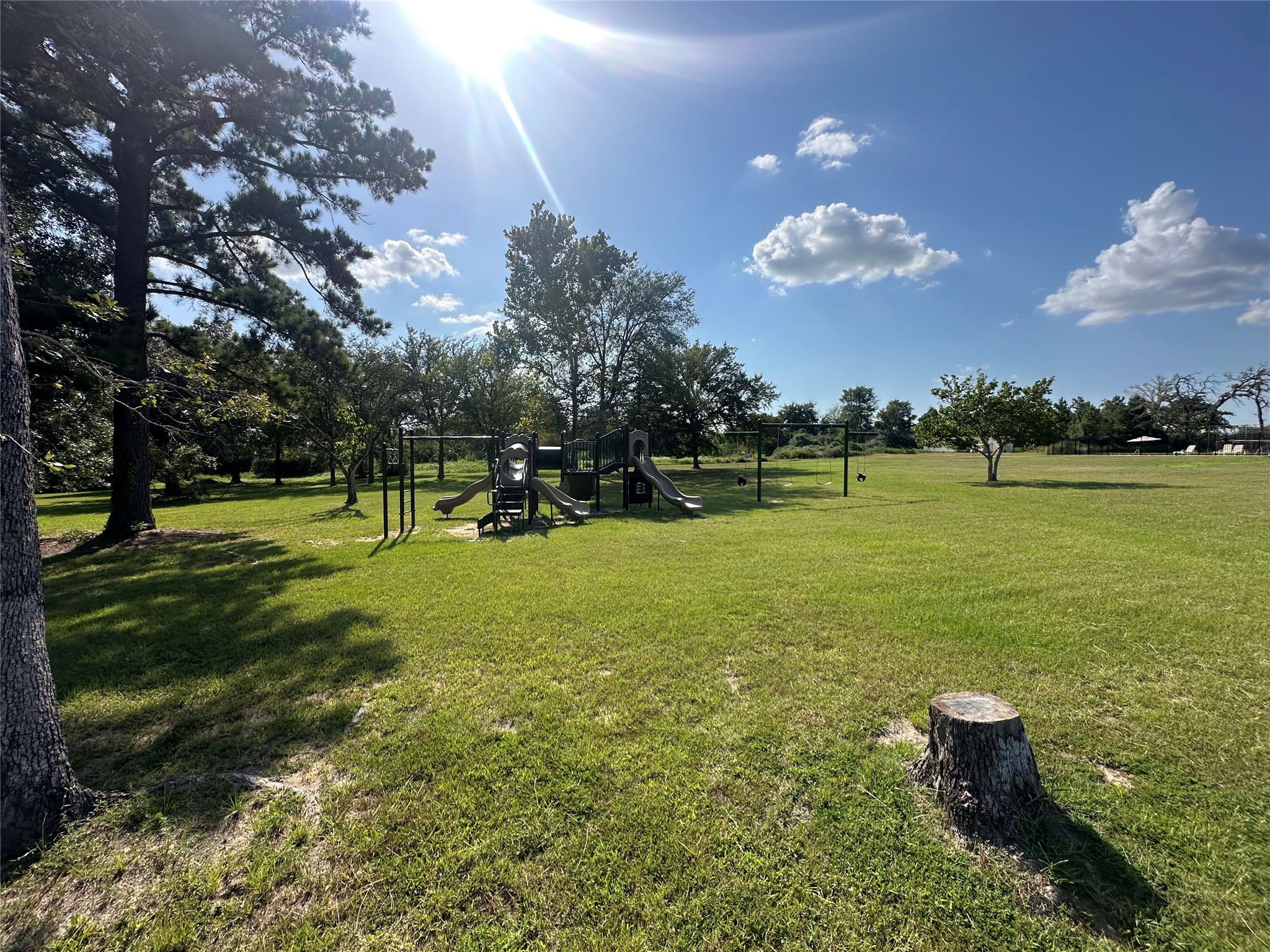 26546 Pin Oak Drive Hempstead, TX 77445 - Photo 7 of 12 a view of a golf course with a lake