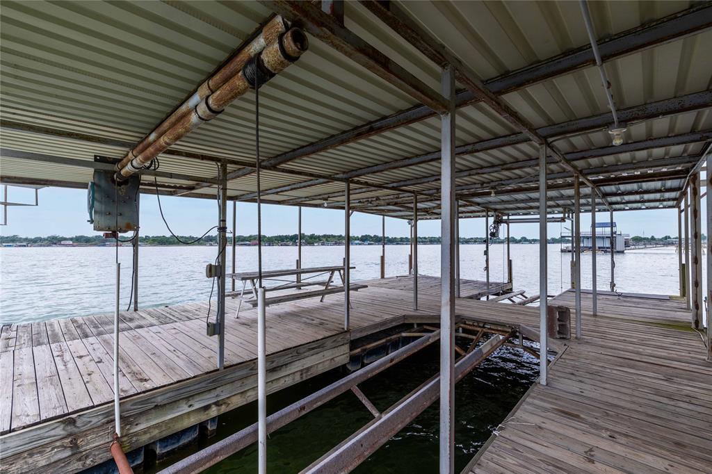 977 Deep Water Road May, TX 76857 - Photo 15 of 36 a outdoor space with lots of wooden furniture