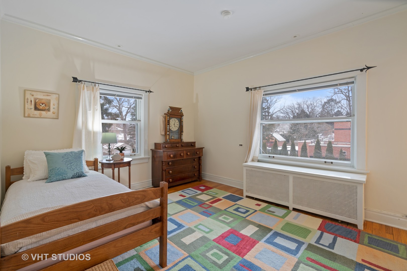610 Forest Avenue Wilmette, IL 60091 - Photo 20 of 50 a bedroom with a bed and a window