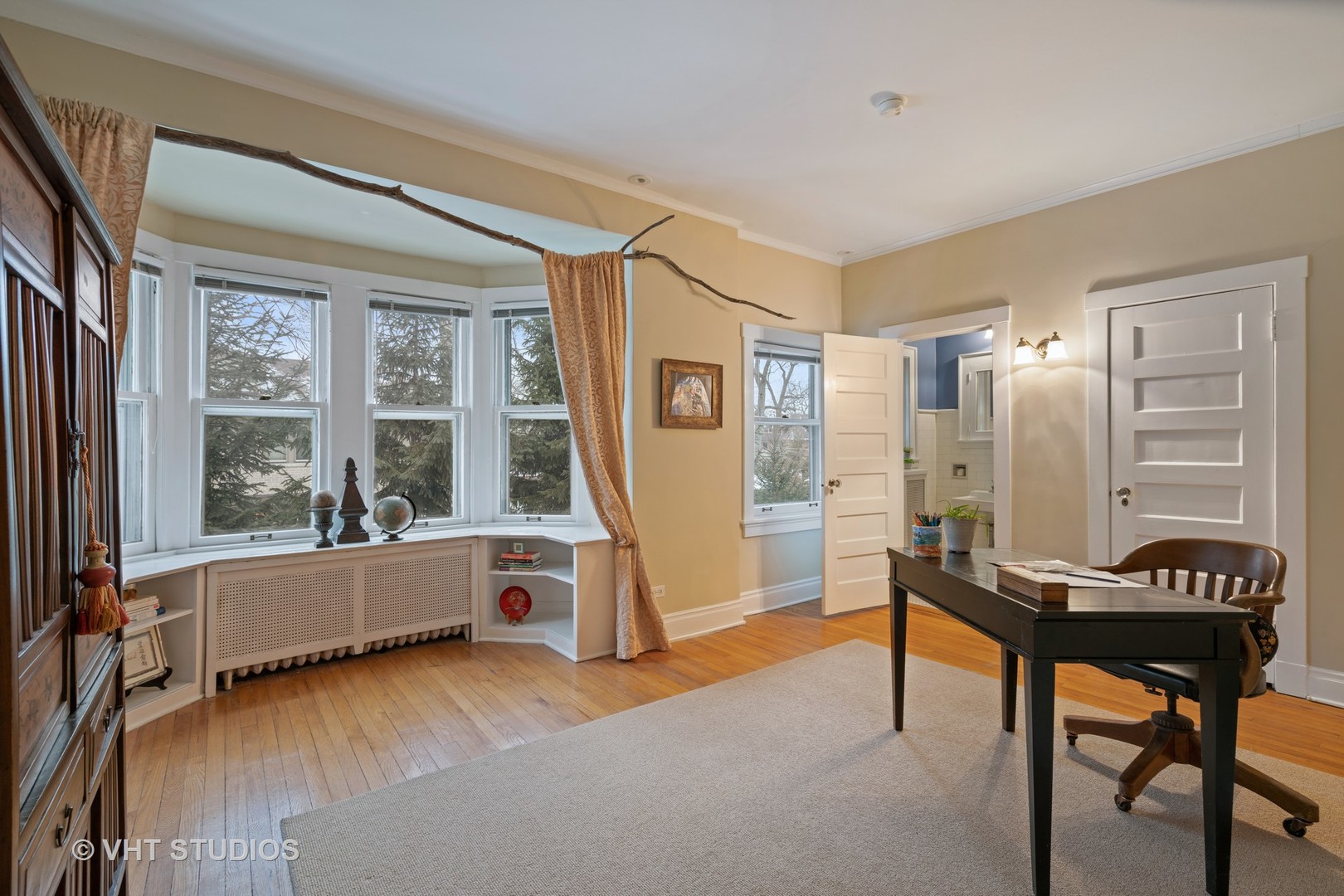 610 Forest Avenue Wilmette, IL 60091 - Photo 21 of 50 a living room with furniture and a window