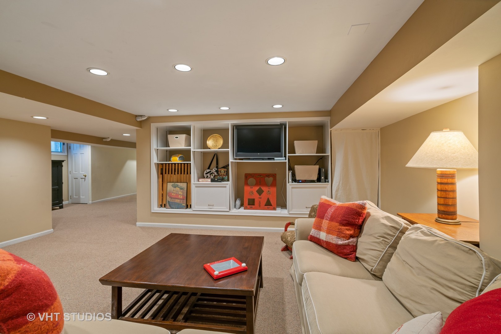 610 Forest Avenue Wilmette, IL 60091 - Photo 24 of 50 a living room with furniture and a fireplace