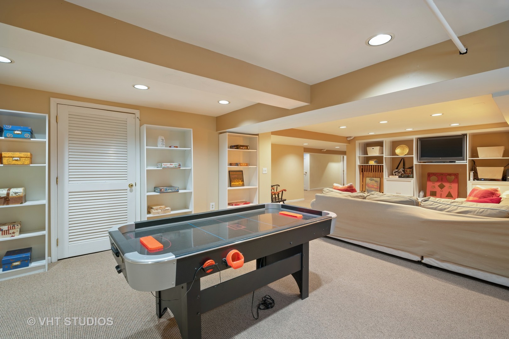 610 Forest Avenue Wilmette, IL 60091 - Photo 25 of 50 a room with furniture pool table and flat screen tv