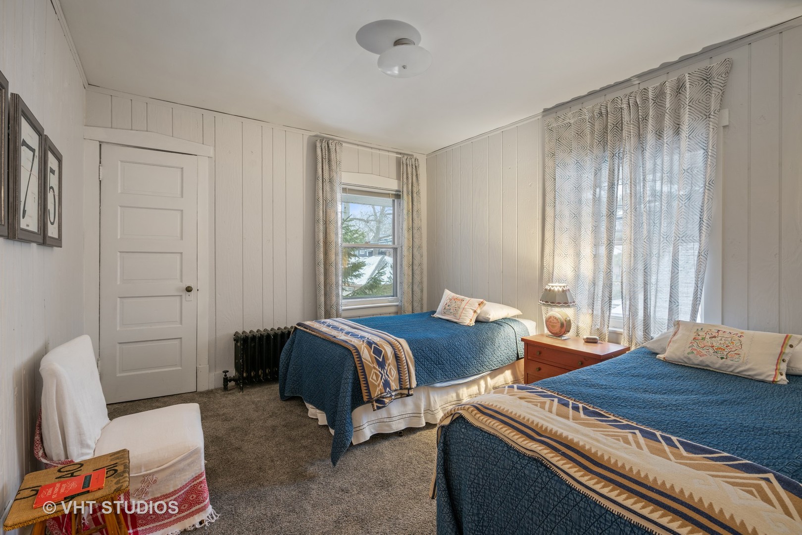 610 Forest Avenue Wilmette, IL 60091 - Photo 31 of 50 a bedroom with two beds and a window