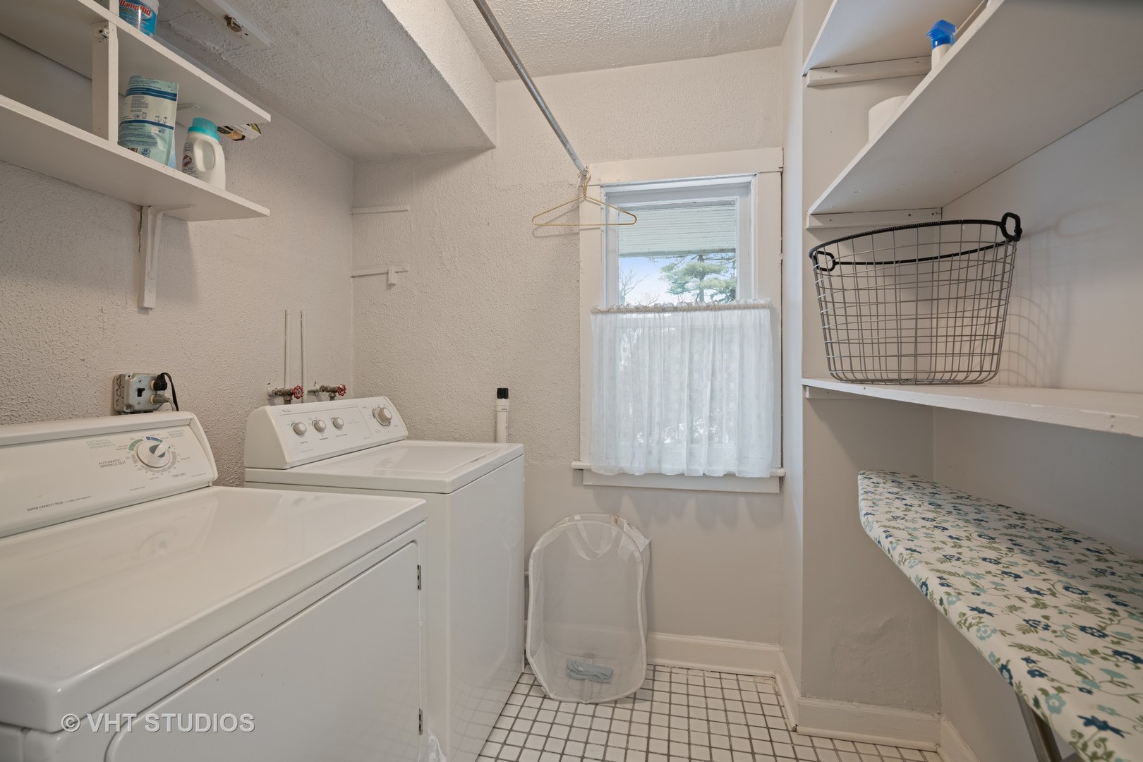 610 Forest Avenue Wilmette, IL 60091 - Photo 34 of 50 a utility room with dryer and washer