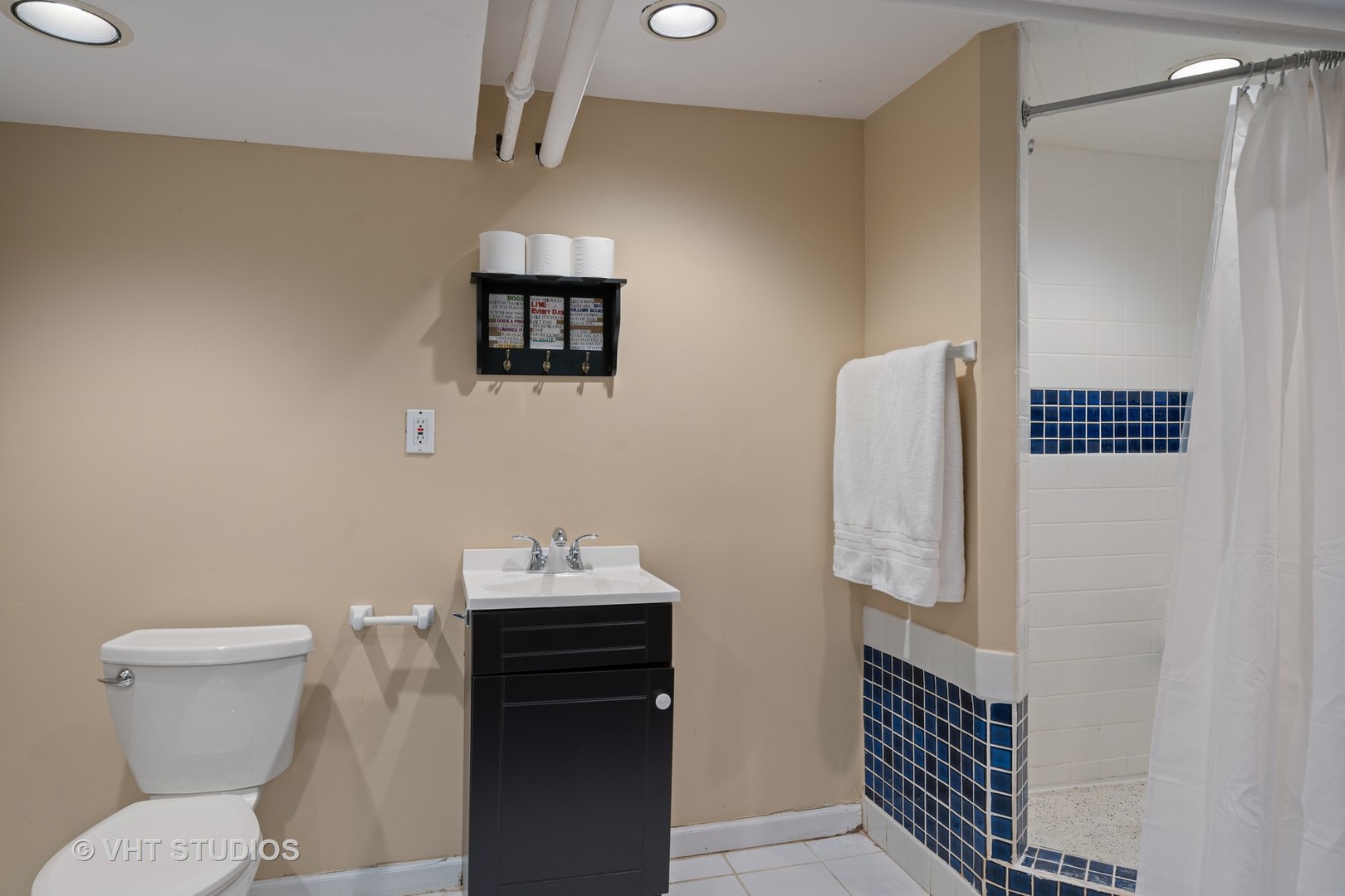 610 Forest Avenue Wilmette, IL 60091 - Photo 35 of 50 a bathroom with a toilet and a shower