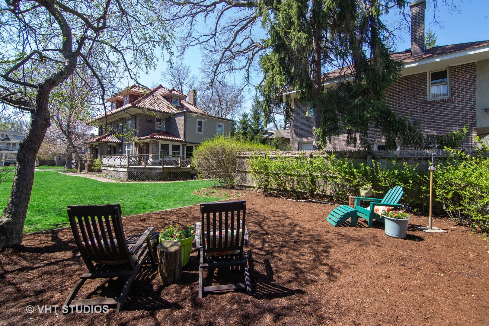 610 Forest Avenue Wilmette, IL 60091 - Photo 36 of 50 a view of a table and chairs in patio with a yard