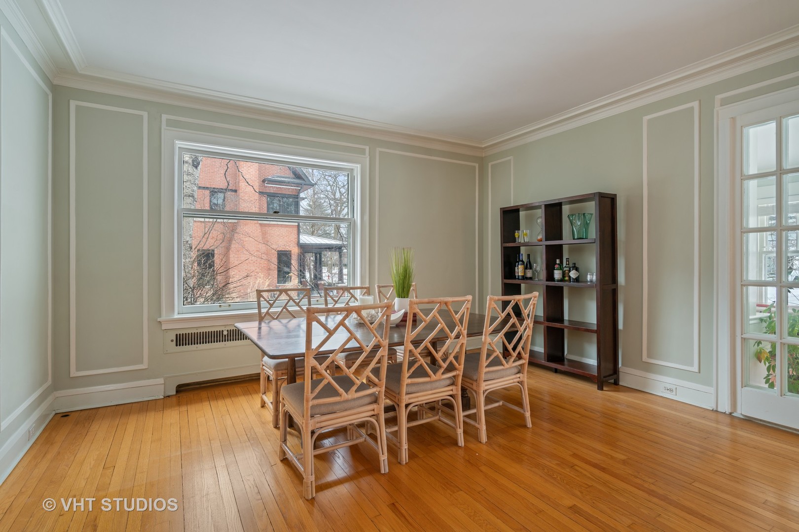 610 Forest Avenue Wilmette, IL 60091 - Photo 7 of 50 a view of a dining room with furniture window and wooden floor